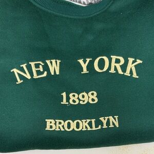 SHEIN Green Sweatshirt with Yellow Lettering